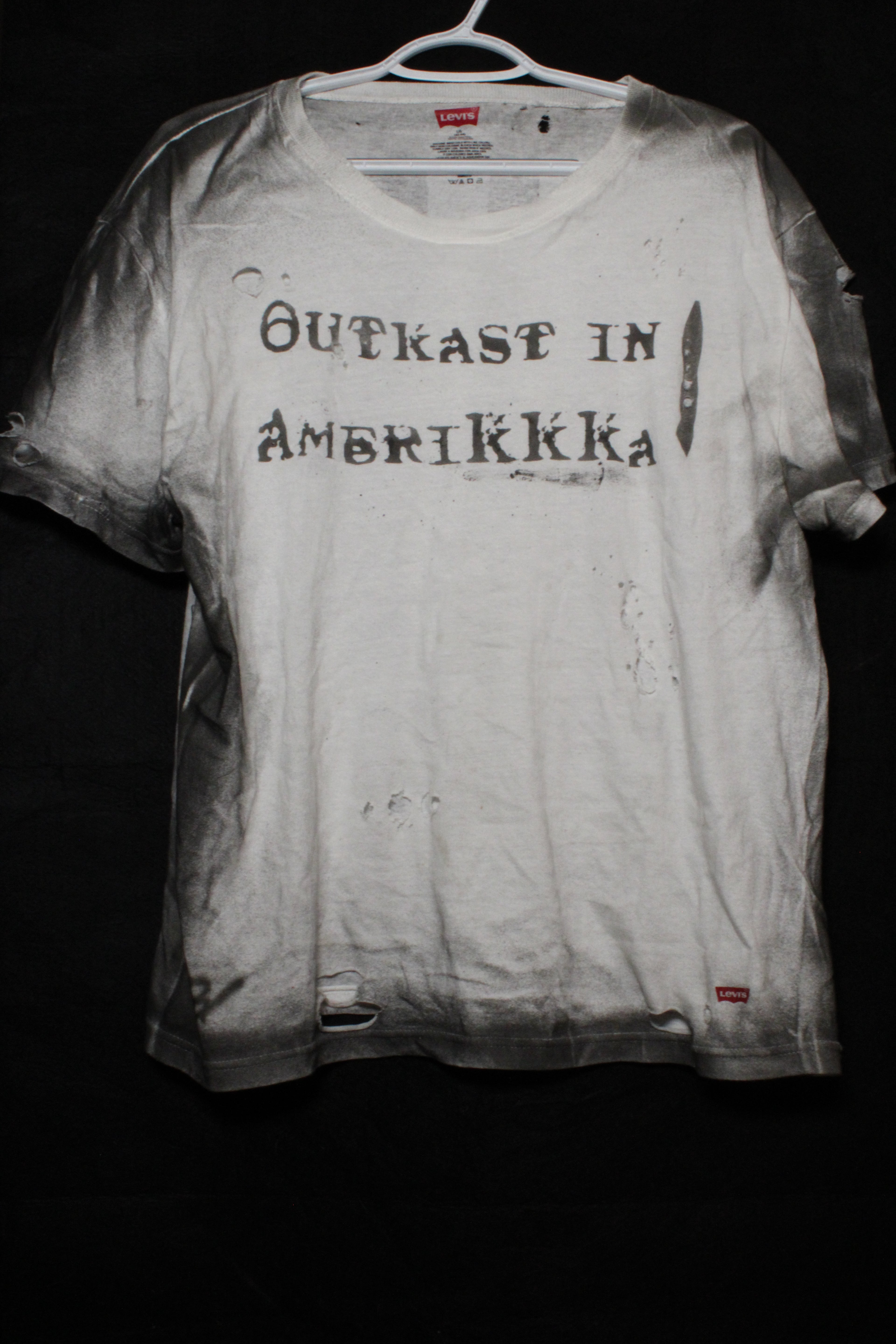 1 of 1 "Amerikkkan Outkast" Distresesd Tee